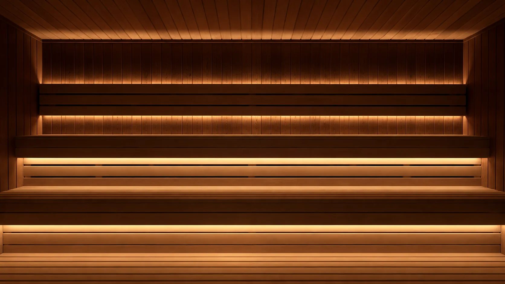 Cedar sauna benches lit by warm strip lights